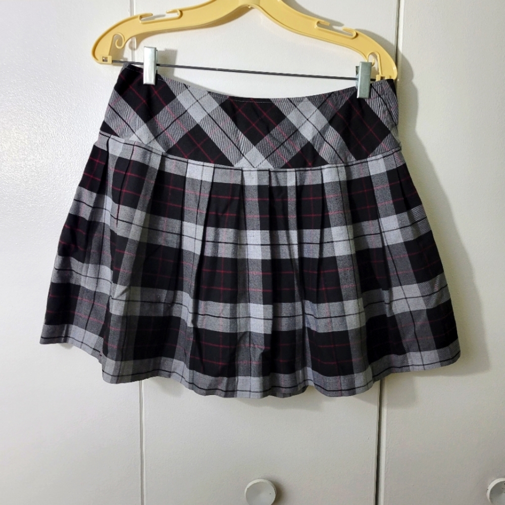 Size 4 mini kilt with shorts sewn inside. Skort.